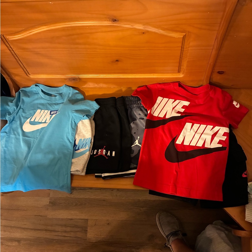 Nike Kids Red and Light Blue Tees outfits. 2 Jordan shorts only.